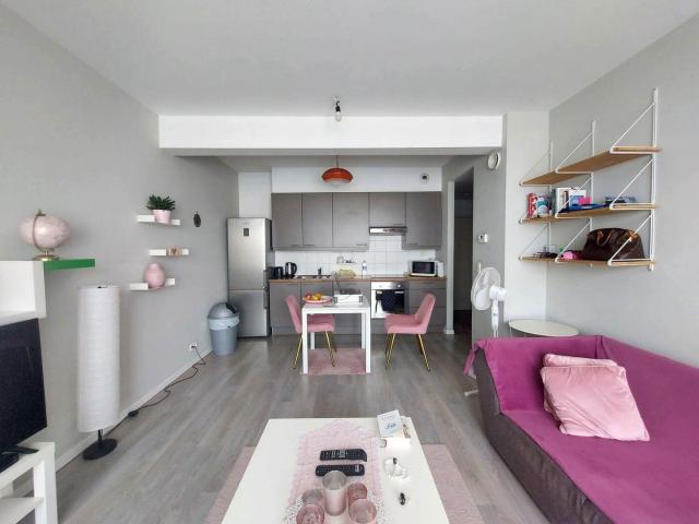 Appartement semi meublé + emplacement de parking intérieur