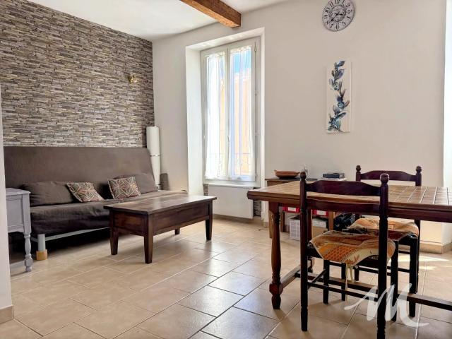 APPARTEMENTS ET GARAGE DANS MAISON DE VILLAGE