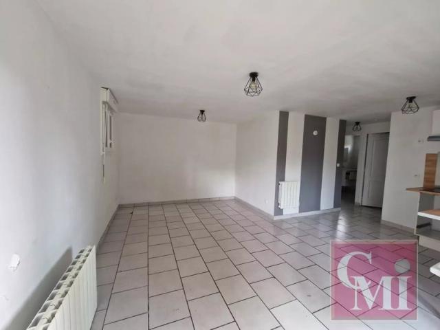 Appatement type F2 au calme, en rez de jardin avec terrasse