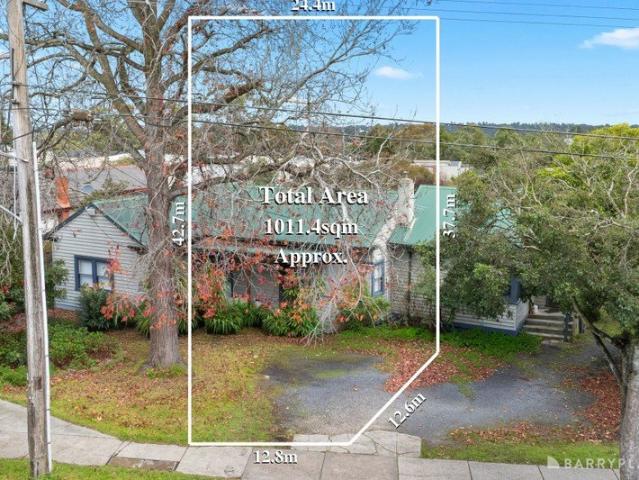 Approved Four Townhouse Site with Three Rental Incomes