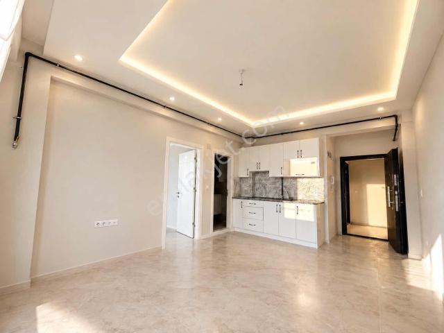 Çarşıya Yürüme Mesafesinde Satılık Sıfır 1+1 Balkonlu Apart