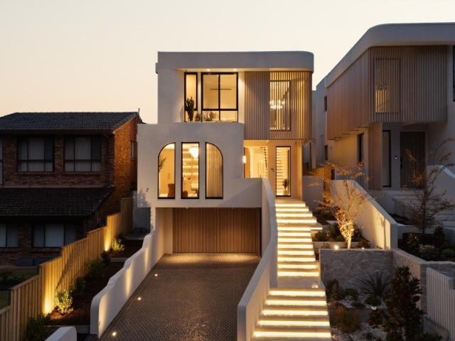 Architectural Masterpiece of Scale and Sophistication with an Expansive Six Car Garage