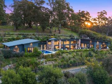 Architectural Masterpiece with Breathtaking Views and Seamless Pavilion Design