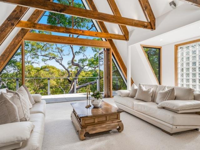 Architectural Masterpiece with Indoor Heated Pool, Lift & Stunning Bush Views