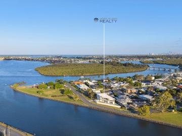 Architectural Masterpiece with Uninterrupted Water & Parkfront Views