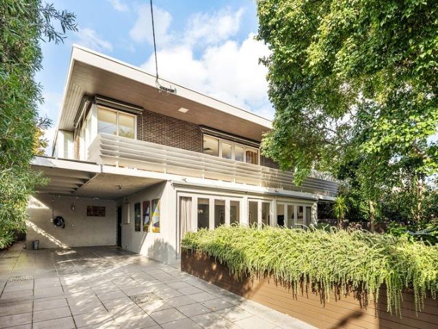 Architectural Mid Century Residence in a Prized Bayside Setting