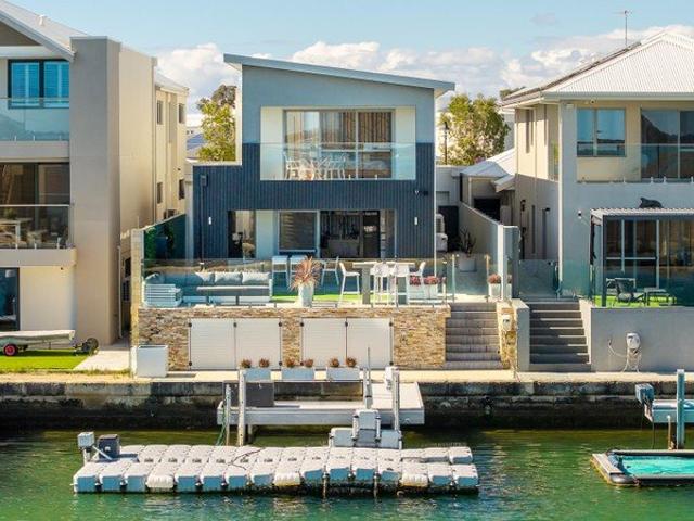 Architectural Canal Waterfront Luxury with Panoramic Estuary Views