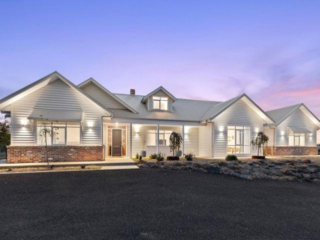 Architectural Coastal Luxury on Expansive Lifestyle Property