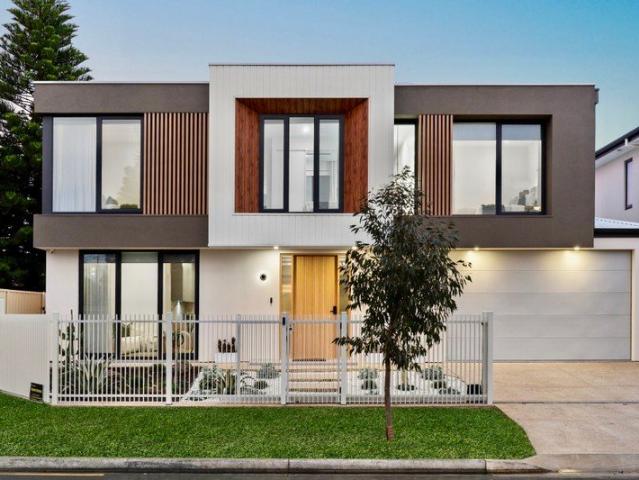 Architectural Coastal Luxury with Lift, Dual Master Suites & Seamless Indoor Outdoor Living