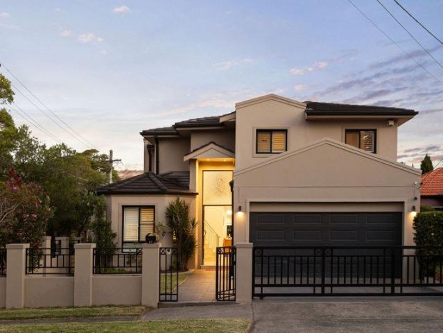 Architectural Double Brick Residence with Expansive Living, Entertaining Basement & Resort Style Outdoor Living