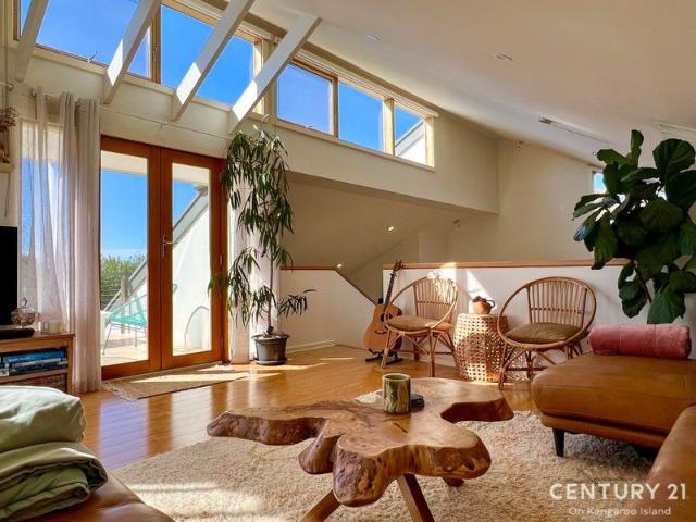Architectural Excellence Meets Modern Coastal Living on Three Land Titles