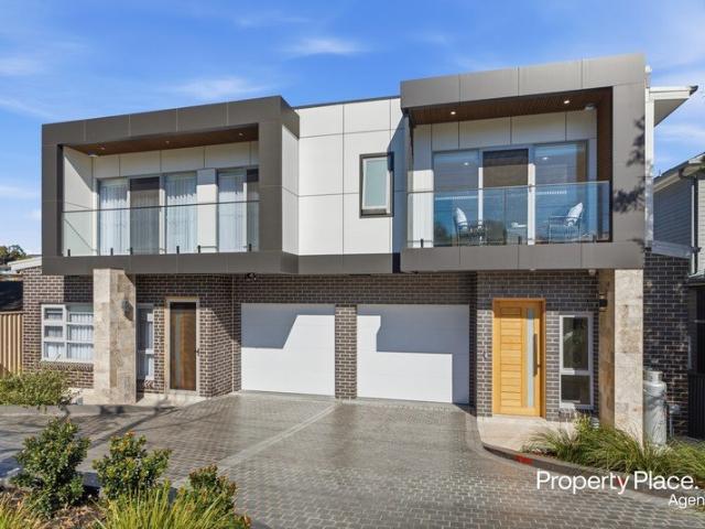 Architectural Excellence | Near New Luxury Duplex with Bushland Outlooks