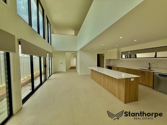 Architectural Edge with Light, Space & a Mezzanine Twist