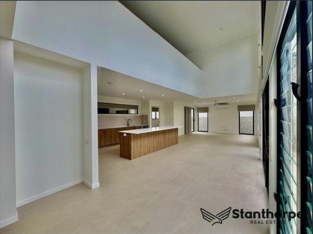 Architectural Edge with Light, Space & a Mezzanine Twist