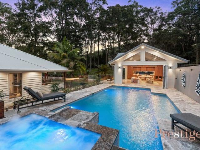 Architectural Elegance Meets Resort Style Acreage Living