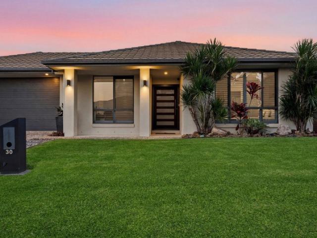Architectural Elegance Meets Family Sized Oasis 4 Living Areas & Secluded Solar Heated Magnesium Pool