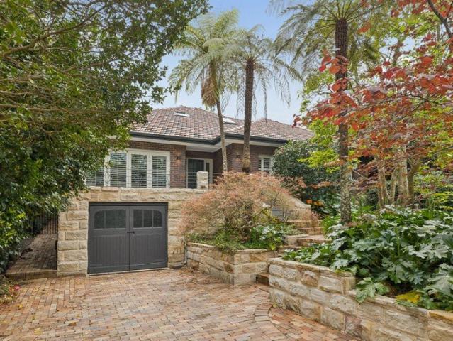 Architectural Elegance in a Coveted East Side Position