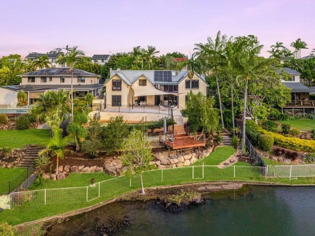 Architectural Elegance with Private Lake Views, Grand Living & Resort Style Entertaining
