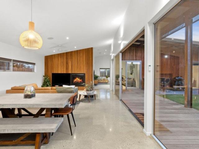 Architectural Family Living with Seamless IndoorOutdoor Flow and Oversized Garage
