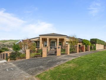 Architectural Family Living with Stunning River & Golf Course Views