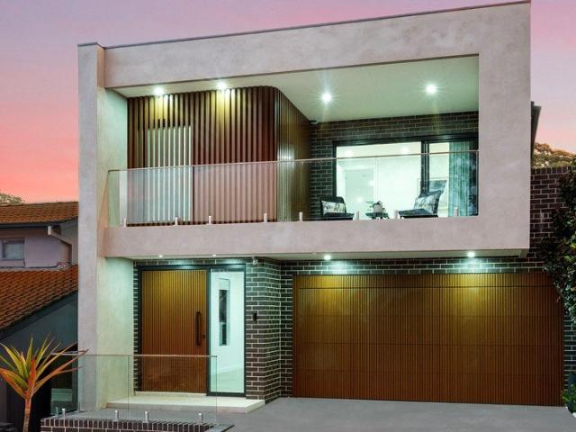 ARCHITECTURAL FREE STANDING FAMILY HOME WITH ATTACHED GARAGE