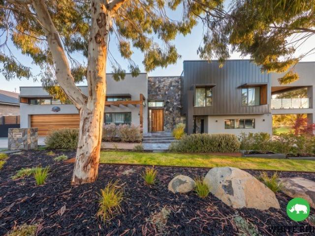 Architectural Grandeur on Prime Parcel of Land!