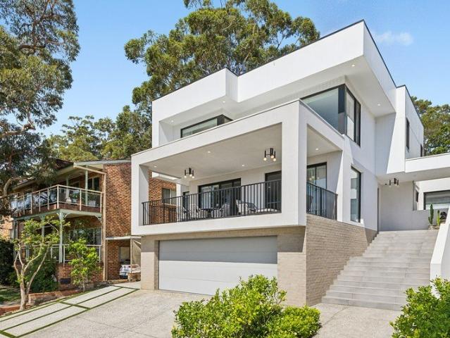 Architectural haven in ravishing bayfront pocket