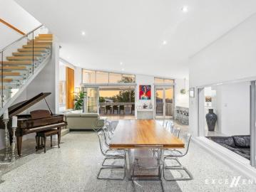 Architectural Icon A Rare Elevated Family Home on Top of the Hill!