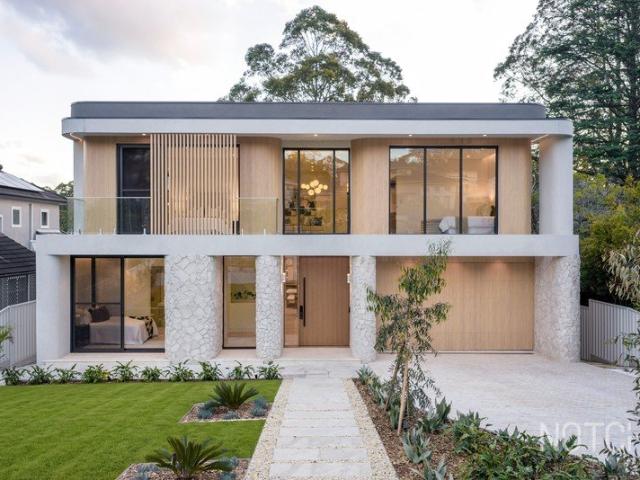 Architectural luxury with an expansive private backyard