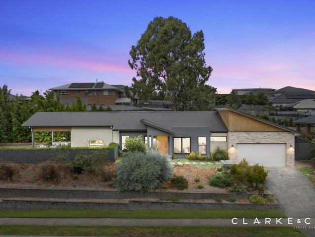 ARCHITECTURAL LUXURY WITH ELEVATED VIEWS!