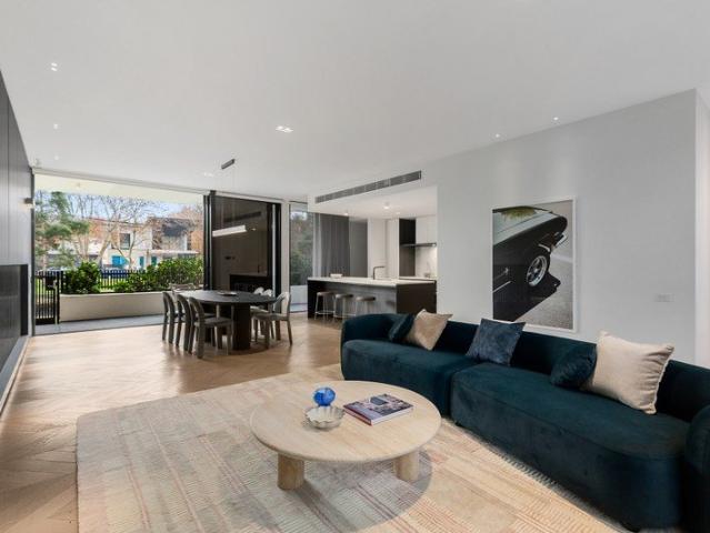 Architectural luxury with waterfront poise and a spectacular rooftop terrace