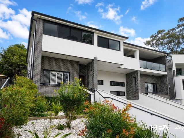 Architectural Luxury, Exceptional Craftsmanship & Four Car Basement Garage