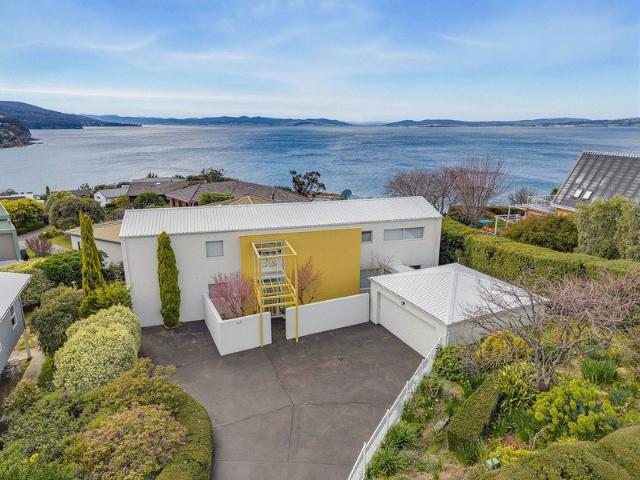 Architectural living with panoramic water views