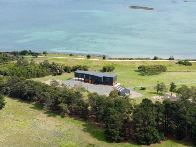 Architectural residence with uninterrupted river views, walking trails from the door and a separate river frontage title