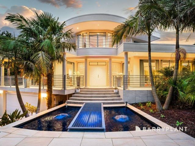 Architectural Showpiece with Unmatched Family Entertaining