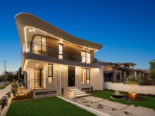 Architectural tri level masterpiece showcasing exceptional parkside luxury