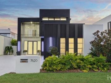 Architectural Waterfront Luxury on Prestigious Fairway Island