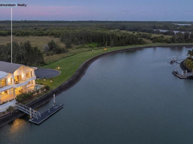 Architectural Waterfront with 180° Views & Bridge Free Boating