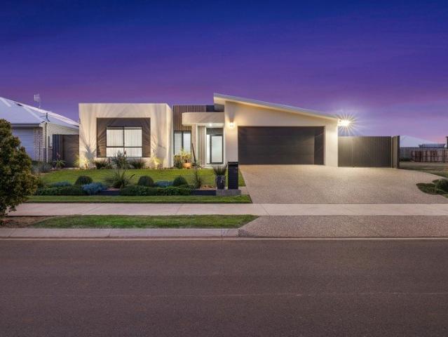 Architecturally Designed Coastal Luxury with Premium Entertaining & Massive Powered Shed