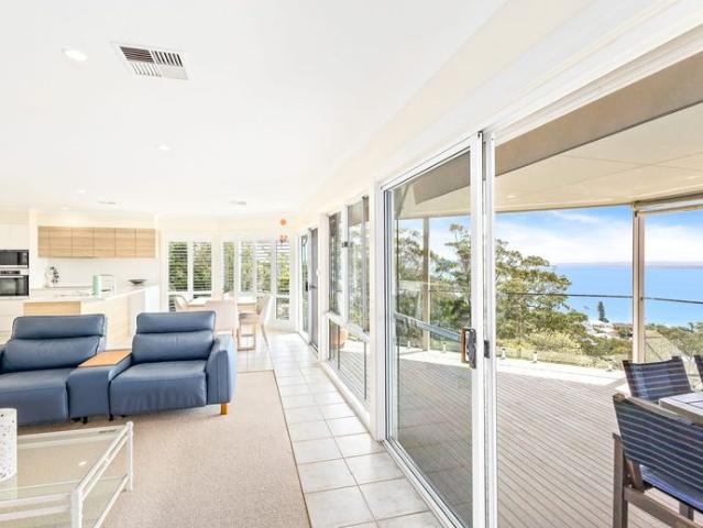 Architecturally Designed Coastal Masterpiece with Panoramic Water Views