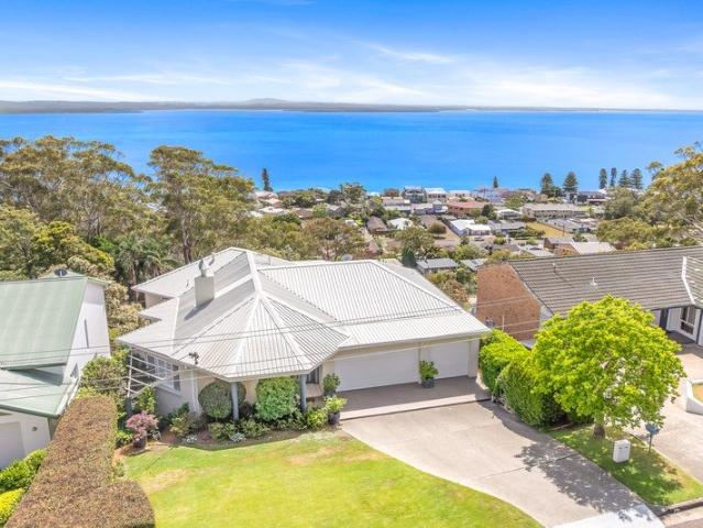 Architecturally Designed Coastal Masterpiece with Panoramic Water Views