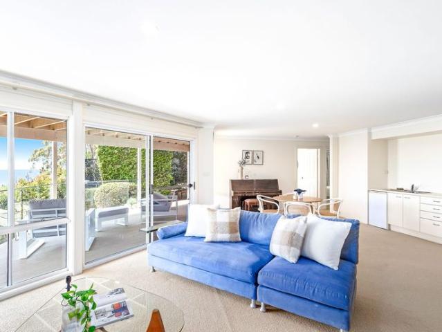 Architecturally Designed Coastal Masterpiece with Panoramic Water Views
