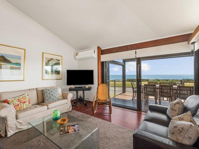 Architecturally Designed Beachfront Home with Magnificent Sea Views