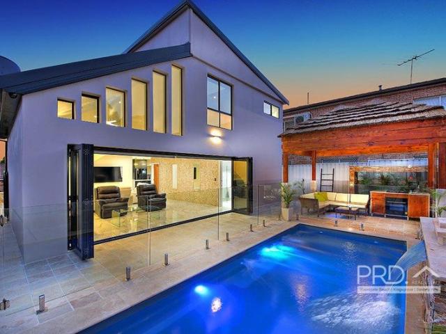 ARCHITECTURALLY DESIGNED FAMILY OASIS WITH LUXURY SECONDARY DWELLING