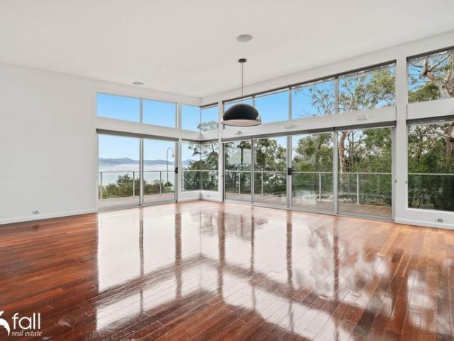 Architecturally Designed Home with Bushland Serenity & Stunning Water Views