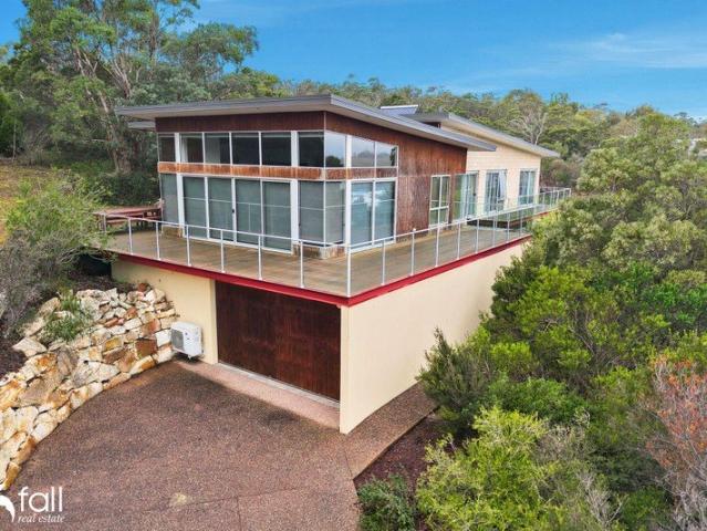 Architecturally Designed Home with Bushland Serenity & Stunning Water Views