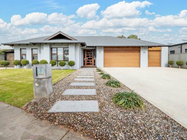Architecturally designed home with golf course views