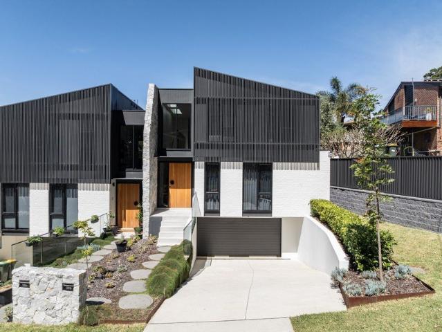 Architecturally designed home with large basement and lift