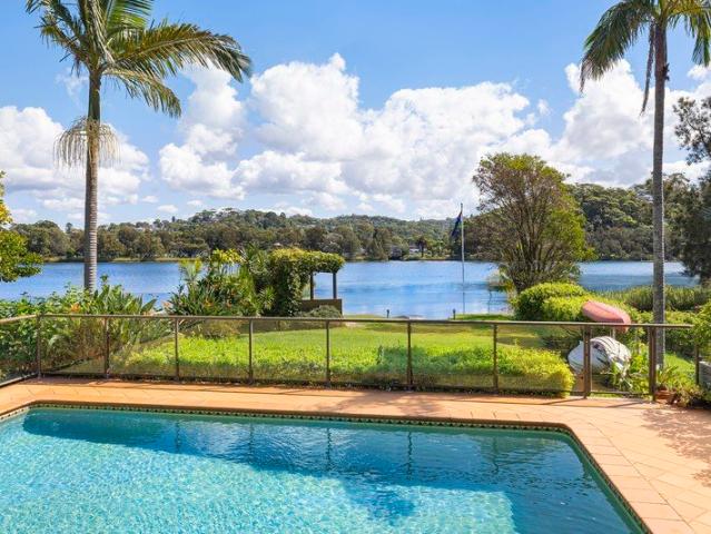 Architecturally Designed Absolute Lakefront Home With Heated Pool and Flexible Living
