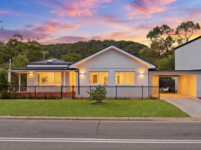 ARCHITECTURALLY DESIGNED & LUXURY BUILT, THREE BEDROOM, TWO BATHROOM HOME ON LOW MAINTENANCE CORNER BLOCK WITH DOUBLE GARAGE!